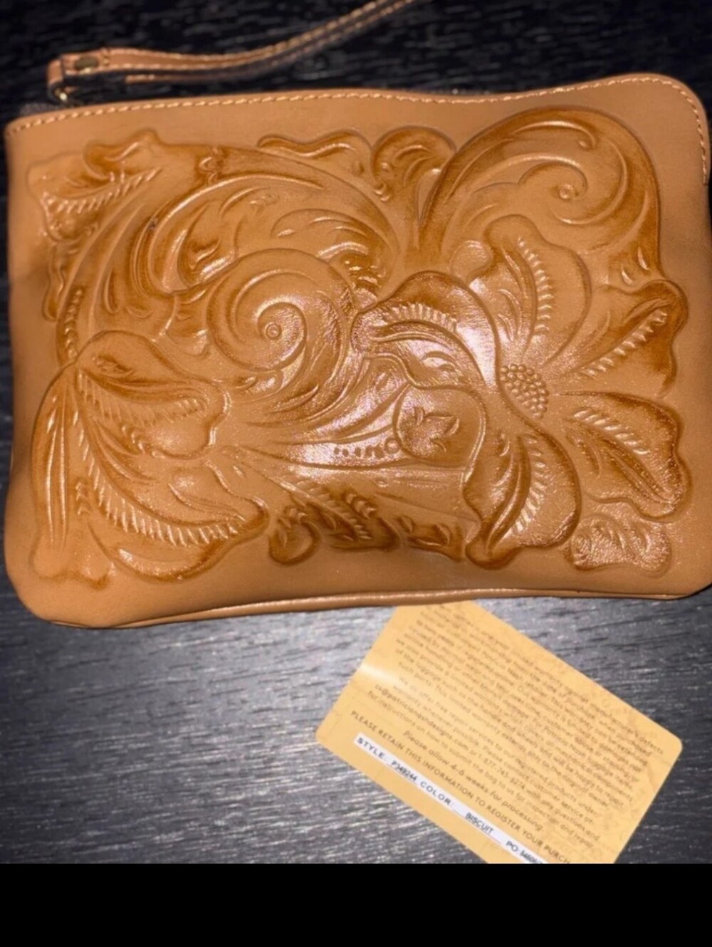 Authentic brand new Patricia Nash clutch in the color biscuit- never used-perect